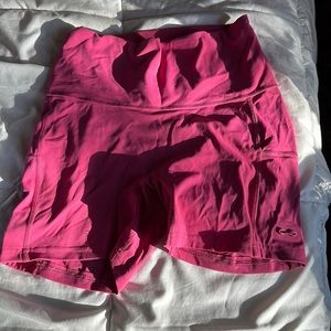 Gymshark pink shorts.